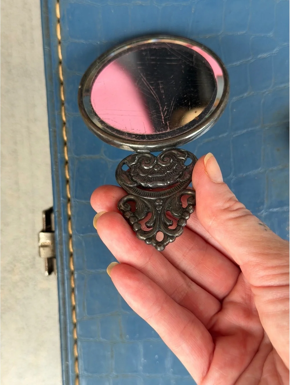 Vintage Decorative Hand Mirror with Engraved Scene and Ornate Handle